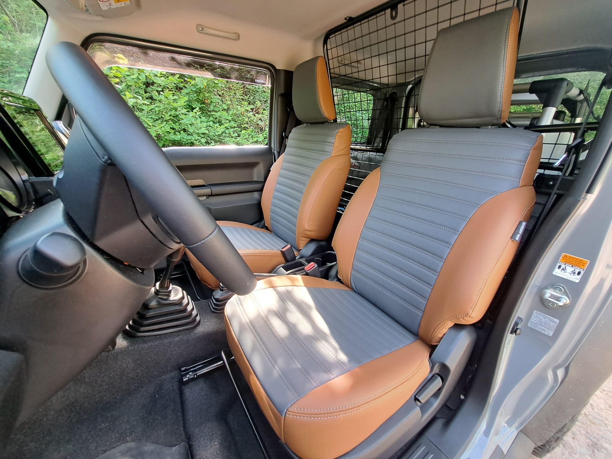 Suzuki Jimny Hj Vordersitze Sitzbezuege Grau Hellbraun